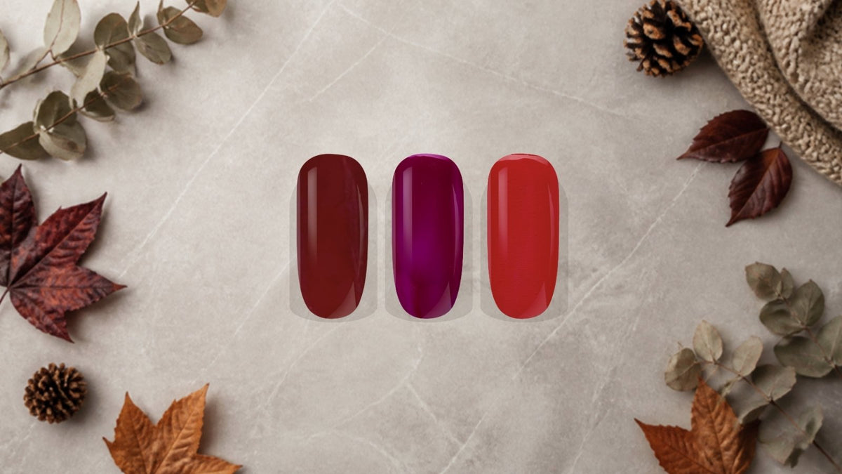 Nageldesign Herbst und Winter: BNC Farbgel Chianti, BNC Farbgel RAL 4004 Claret Violet und BNC Farbgel Vampire Kiss als Farbmuster mit Herbstlaub