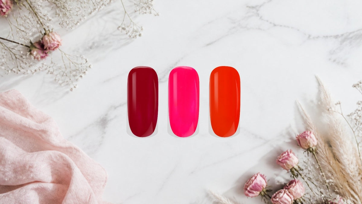 Shellac UV-Lack für Pediküre und Maniküre: BNC Shellac UV/LED-Lack Dunkelrot, Neon Pink und Neon Flammrot als Farbmuster auf Marmor