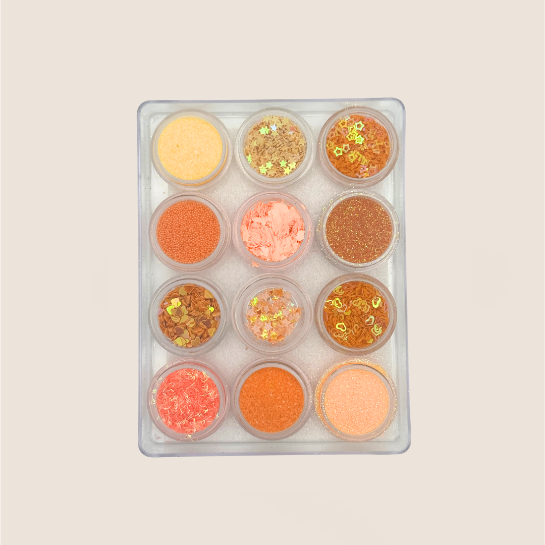 Accessories for the nails / 12 jars of glitter / pearls / stones / flakes / brocade / set orange-apricot / No. 12