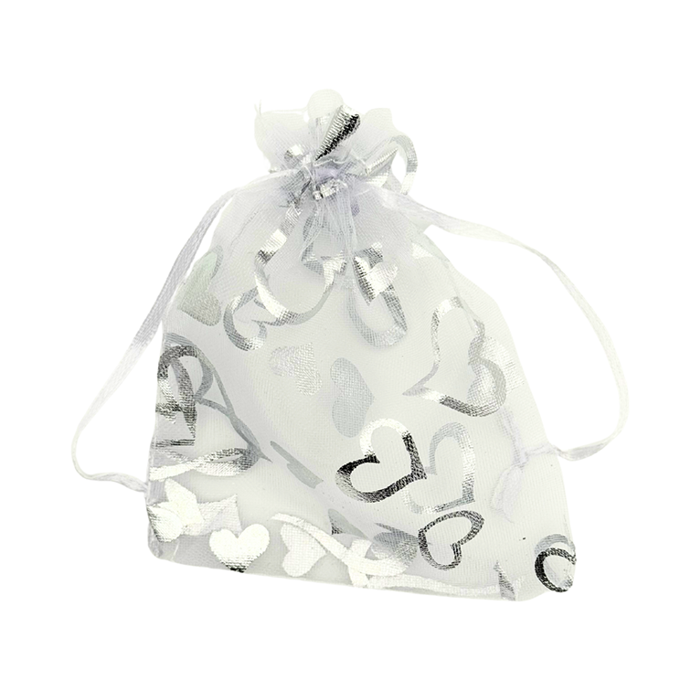 Filled organza bag silver No. 3 with 6 ml nail oil and 1 sheet of Christmas stickers