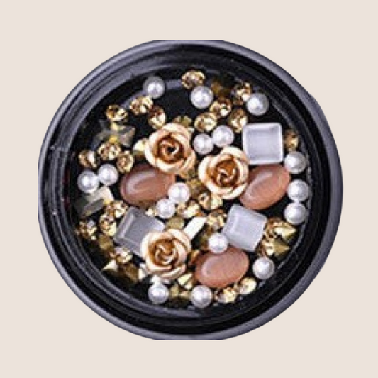 Nail art tin with metal roses, crystal gemstones, opals and rhinestones. No. 1 rose gold